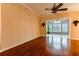 Living room with hardwood floors and access to sunroom at 776 Wigston Ct., Myrtle Beach, SC 29579