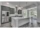 Modern kitchen with grey cabinets and large island at 1817 Woodstork Dr., Conway, SC 29526