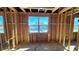 Under-construction bedroom with large window offering water views at 1817 Woodstork Dr., Conway, SC 29526