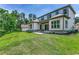 Two-story house with a large backyard and a covered patio at 1817 Woodstork Dr., Conway, SC 29526