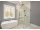 Spa-like bathroom with a soaking tub and walk-in shower at 1817 Woodstork Dr., Conway, SC 29526