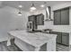 Modern kitchen with marble countertops and stainless steel appliances at 1817 Woodstork Dr., Conway, SC 29526