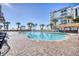 Outdoor pool with lounge chairs and ocean view at 7200 N Ocean Blvd. # 853, Myrtle Beach, SC 29572