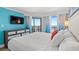 Ocean view bedroom with king-size bed and balcony access at 7200 N Ocean Blvd. # 853, Myrtle Beach, SC 29572
