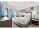 King-size bed in bright bedroom with ocean view at 7200 N Ocean Blvd. # 853, Myrtle Beach, SC 29572