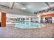 Indoor pool with brick patio and seating area at 7200 N Ocean Blvd. # 853, Myrtle Beach, SC 29572