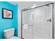 Bathroom with shower and blue walls at 7200 N Ocean Blvd. # 853, Myrtle Beach, SC 29572