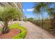 Landscaped walkway to the beach with palm trees at 4719 South Ocean Blvd. # 309, North Myrtle Beach, SC 29582