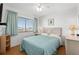 Guest bedroom with a queen bed and ocean view at 4719 South Ocean Blvd. # 309, North Myrtle Beach, SC 29582