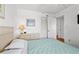 Guest bedroom with a queen bed and closet at 4719 South Ocean Blvd. # 309, North Myrtle Beach, SC 29582
