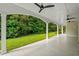 Large covered patio with tile flooring and ceiling fans at 1847 Woodstork Dr., Conway, SC 29526