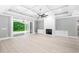 Living area with fireplace, high ceilings, and sliding glass doors at 1847 Woodstork Dr., Conway, SC 29526