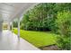 Covered patio overlooking a lush green backyard at 1847 Woodstork Dr., Conway, SC 29526