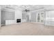 Spacious living room featuring a fireplace and coffered ceiling at 1847 Woodstork Dr., Conway, SC 29526