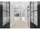 Elegant entryway with double doors and a chandelier at 1847 Woodstork Dr., Conway, SC 29526
