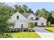 Two-story house with gray siding and stone accents at 1847 Woodstork Dr., Conway, SC 29526
