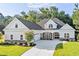 Two-story house with gray siding and stone accents at 1847 Woodstork Dr., Conway, SC 29526