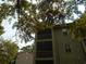 Green-sided building with balconies and screened porch at 562 Blue Stem Dr. # 54R, Pawleys Island, SC 29585