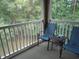 Private balcony overlooking wooded area with seating at 562 Blue Stem Dr. # 54R, Pawleys Island, SC 29585