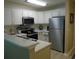 Galley kitchen with stainless steel appliances and white cabinets at 562 Blue Stem Dr. # 54R, Pawleys Island, SC 29585