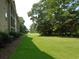 Building exterior with landscaping and green space at 562 Blue Stem Dr. # 54R, Pawleys Island, SC 29585