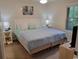 Main bedroom with a king-size bed and light blue bedding at 562 Blue Stem Dr. # 54R, Pawleys Island, SC 29585