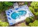 Inviting kidney-shaped pool with a surrounding patio and lounge chairs at 1301 Sweetwater Blvd. # 1301, Murrells Inlet, SC 29576