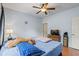 Spacious bedroom with a large bed, ceiling fan and dresser at 1301 Sweetwater Blvd. # 1301, Murrells Inlet, SC 29576