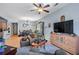 Comfortable living room with seating area, TV, and dining area view at 1301 Sweetwater Blvd. # 1301, Murrells Inlet, SC 29576