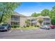 Well-maintained building exterior with parking and landscaping at 1301 Sweetwater Blvd. # 1301, Murrells Inlet, SC 29576