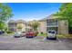 Attractive building exterior with parking spaces and landscaping at 1301 Sweetwater Blvd. # 1301, Murrells Inlet, SC 29576