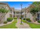 Two-story building with landscaping, offering a welcoming entrance at 1301 Sweetwater Blvd. # 1301, Murrells Inlet, SC 29576