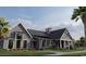 Community clubhouse with gray siding, large windows, and landscaping at 335 Broughton Dr., Myrtle Beach, SC 29579