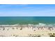 Aerial view of a beach with people, umbrellas, and the ocean at 1105 S Ocean Blvd. # 1204, Myrtle Beach, SC 29572