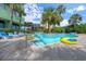 Resort-style pool with lounge chairs and inflatable tubes at 1105 S Ocean Blvd. # 1204, Myrtle Beach, SC 29572