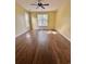 Well-lit bedroom with hardwood floors and large windows at 3609 White Oleander Ct., North Myrtle Beach, SC 29582