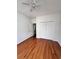 Bright bedroom with hardwood floors, double door closet, and an additional door at 3609 White Oleander Ct., North Myrtle Beach, SC 29582