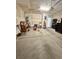 Attached garage with ample storage shelving and a water heater at 3609 White Oleander Ct., North Myrtle Beach, SC 29582