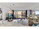 Living room with sofa, balcony view, and a coastal theme at 5511 N Ocean Blvd. # 306, Myrtle Beach, SC 29577