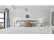 Main bedroom with king bed and calming decor at 5511 N Ocean Blvd. # 306, Myrtle Beach, SC 29577
