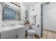 Simple bathroom with white fixtures and coastal decor at 5511 N Ocean Blvd. # 306, Myrtle Beach, SC 29577