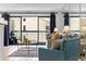 Living area with comfy seating and access to a balcony at 5511 N Ocean Blvd. # 306, Myrtle Beach, SC 29577