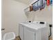 Laundry room with washer, dryer, and shelving at 2009 Spring Valley Ct., Loris, SC 29569