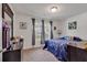 Bedroom with large window and a comfortable bed at 2009 Spring Valley Ct., Loris, SC 29569