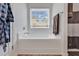 Clean bathroom with a large soaking tub and window at 2009 Spring Valley Ct., Loris, SC 29569