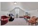 Bonus room with a TV, seating area and great lighting at 2009 Spring Valley Ct., Loris, SC 29569