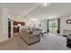 Open living room with sectional sofa and access to kitchen at 2009 Spring Valley Ct., Loris, SC 29569