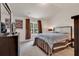 Comfortable bedroom with a queen-size bed, dresser, and large window at 2009 Spring Valley Ct., Loris, SC 29569
