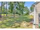 Spacious backyard with lush grass and golf course view at 2009 Spring Valley Ct., Loris, SC 29569