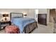 Spacious bedroom with a queen-size bed and en-suite bathroom at 2009 Spring Valley Ct., Loris, SC 29569